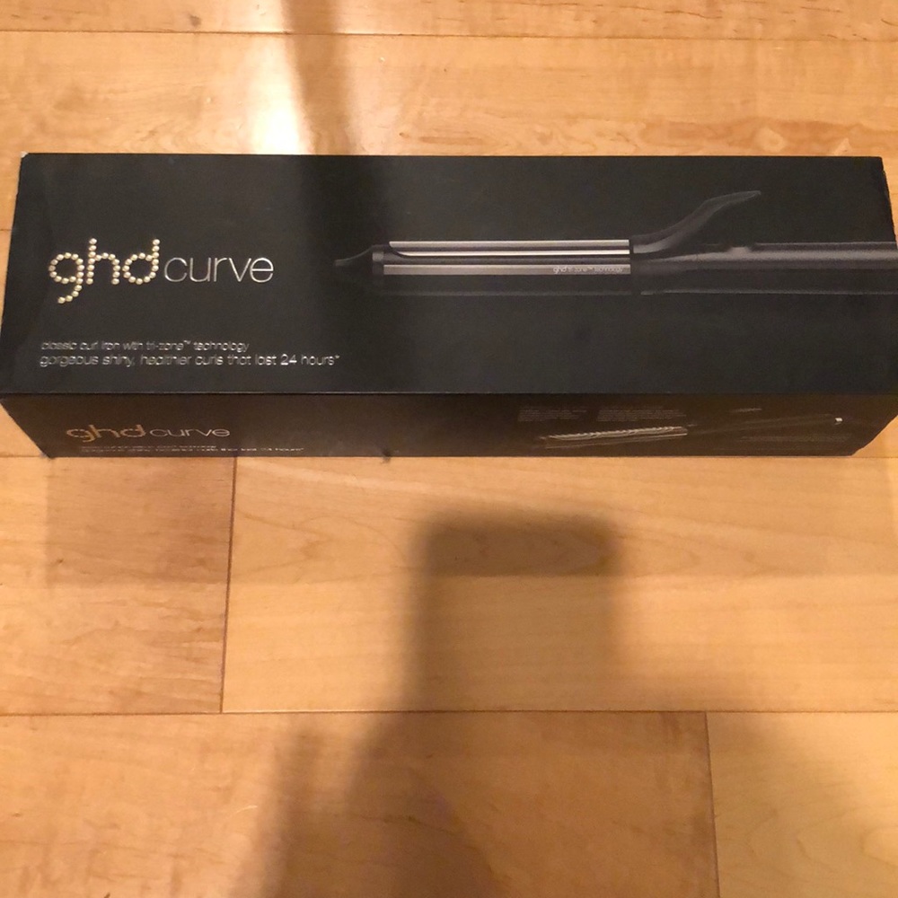New, never been used ghd curl iron